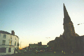 [looking into Moor Lane with a church on the right]