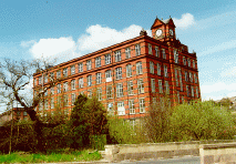 [red bricked mill building]