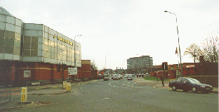 [view of street past store]