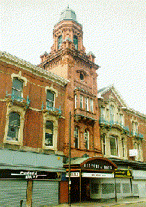 [terracotta hall entrance with tower]