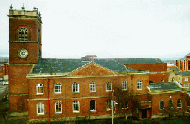 [Red brick church and tower]