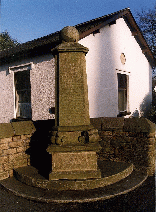 [large carved
stone post]