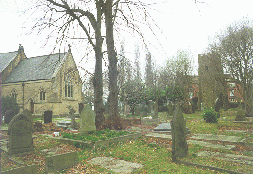 [tower and church in the graveyard]