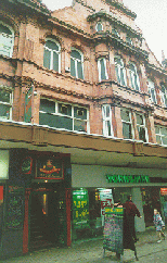 [Doorway and front of red bricked building]