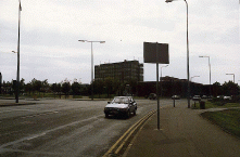 [tower block and road]
