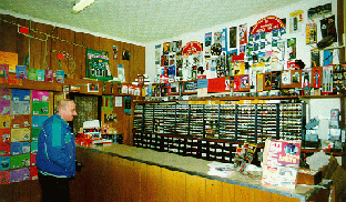 [interior of shop facing counter]