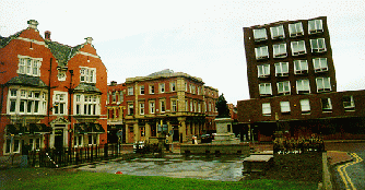 [Crompton's statue from behind and Bradshawgate]