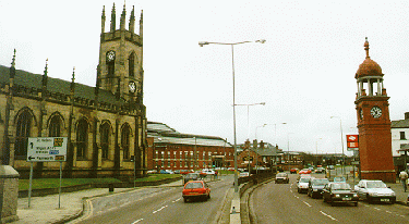 [west with church on left, junction ahead]