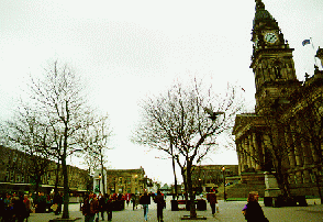 [Pedestrianised area and town hall on right]