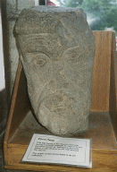 [carved stone head]